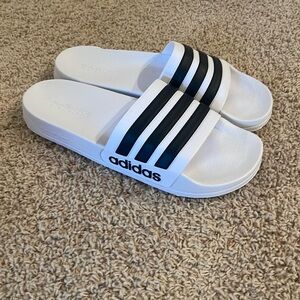 Brand New!! Adidas slides. White with black stripes size 10